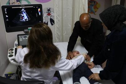 YARIM KALPLE DOĞDU, TAM KALPLE HAYATA TUTUNDU