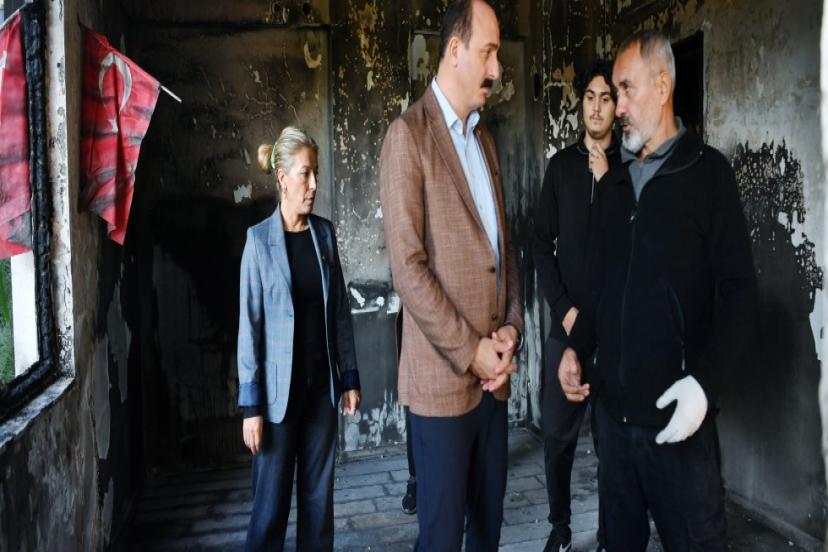 KOTAN EVİ YANAN AİLEYİ ZİYARET ETTİ